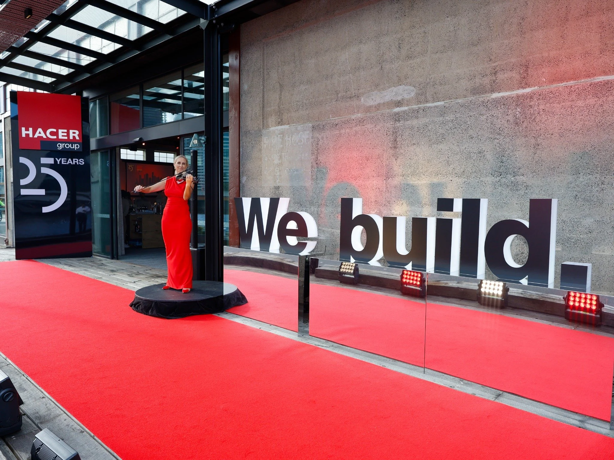 Celebrating @hacergroup &rsquo;s 25 years with @sweetmangoconsulting to achieve this lovely event ❤️🍸🏗️
Mirrored plinths, backlit letters, an illuminated freestanding wall and a luxurious red carpet. 
#events #melbevents #backlitletters #lightbox #