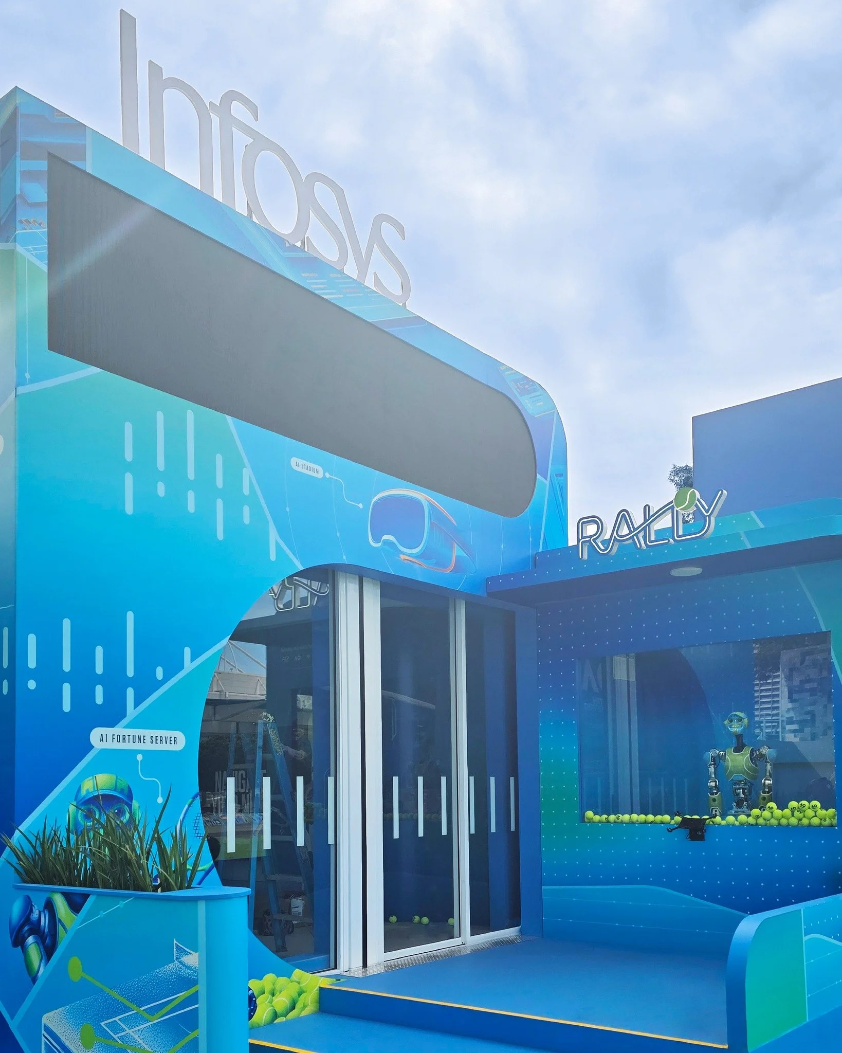 Hitting big with the Infosys Match Centre at the AO 🎾 with @republiceventsaus full wall wraps, court flooring, fabricated lettering and LED feature lighting 🤖💙 

#AusOpenWithInfosys #NavigateYourNext #AO2026 #AusOpen #Melbourne
