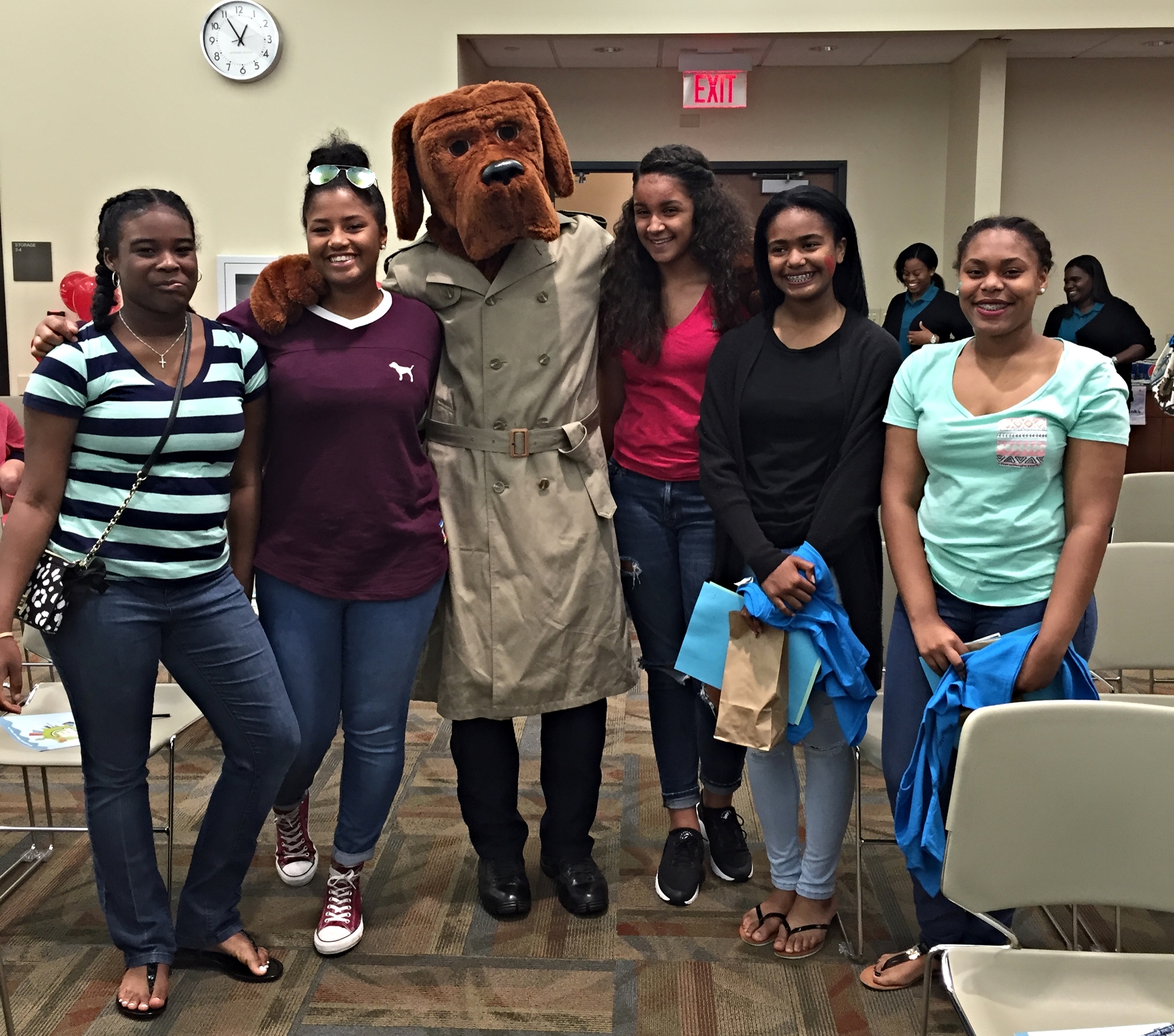 Hearts of Hope Youth Advisory Board members (Madisyn Willis, Amber Hall, AnyaRae Joseph, Micaiah McZeal & Carah Gardiner) stand with McGruff against child sexual abuse