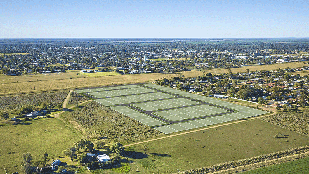 Illustration for an aerial view of a new residential development with multiple building plots and paved roads, surrounded by open fields and a suburban area in the distance.