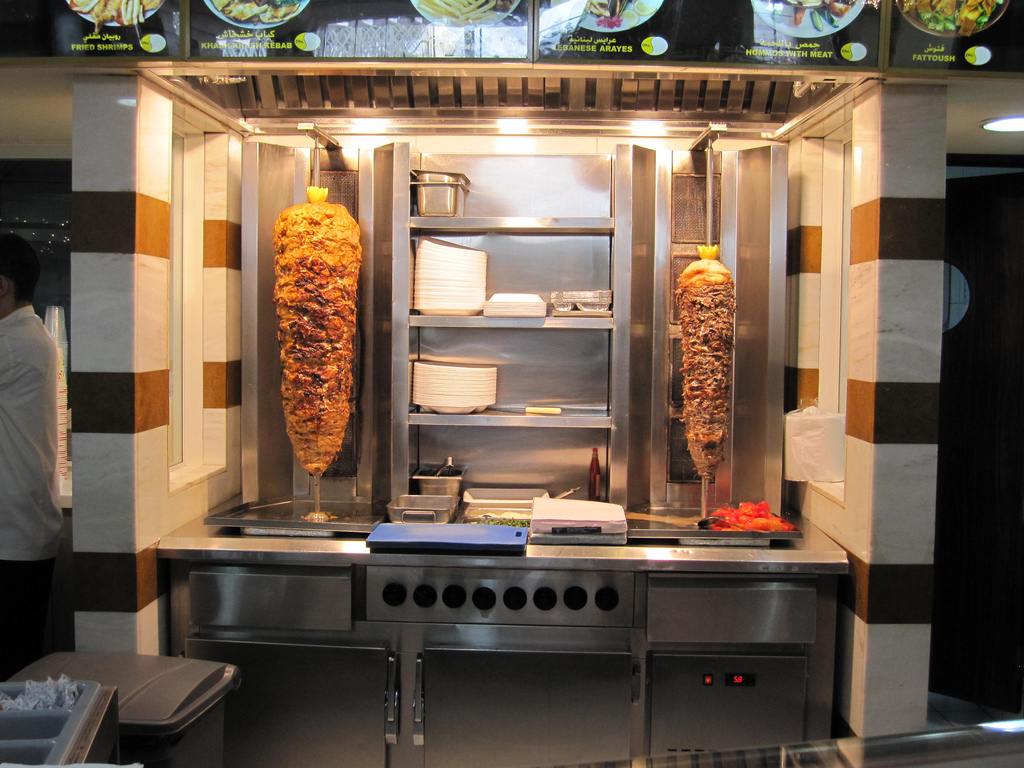 Example of a seasoned shawarma being roasted / Flickr