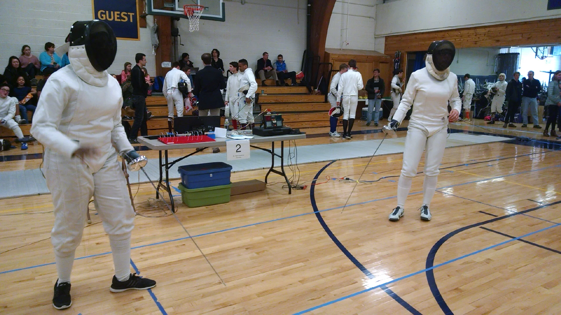STEM Academy's Faisa Mohammed, left, prepares for a bout during the state championships this past February in St. Paul.