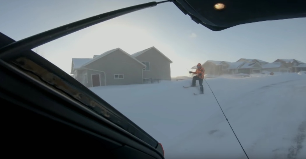 Watch: Skier hooks onto Jeep and glides through Rochester neighborhood