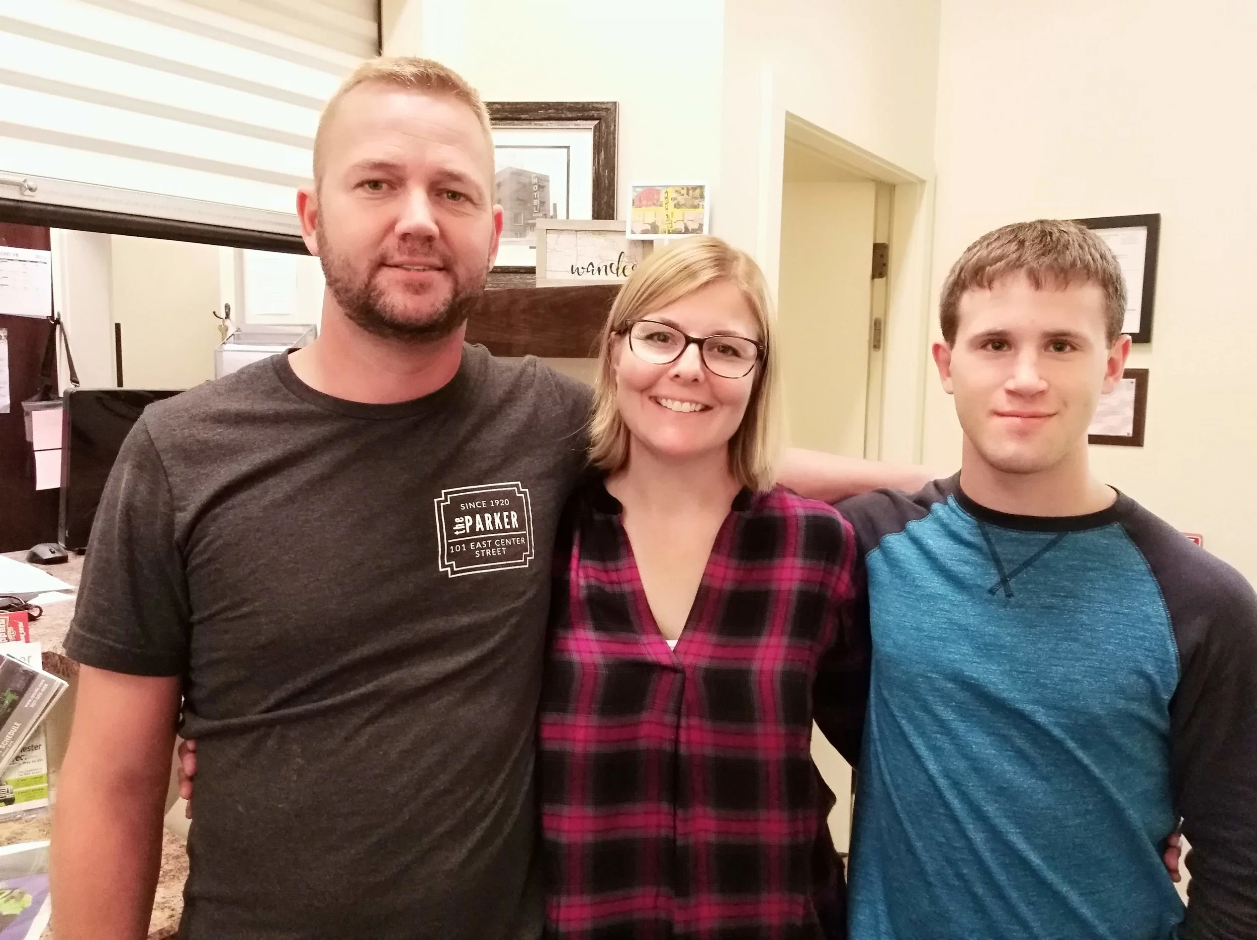 Left to right: Andy, Kari and Jared. Jared helps the couple manage their properties.