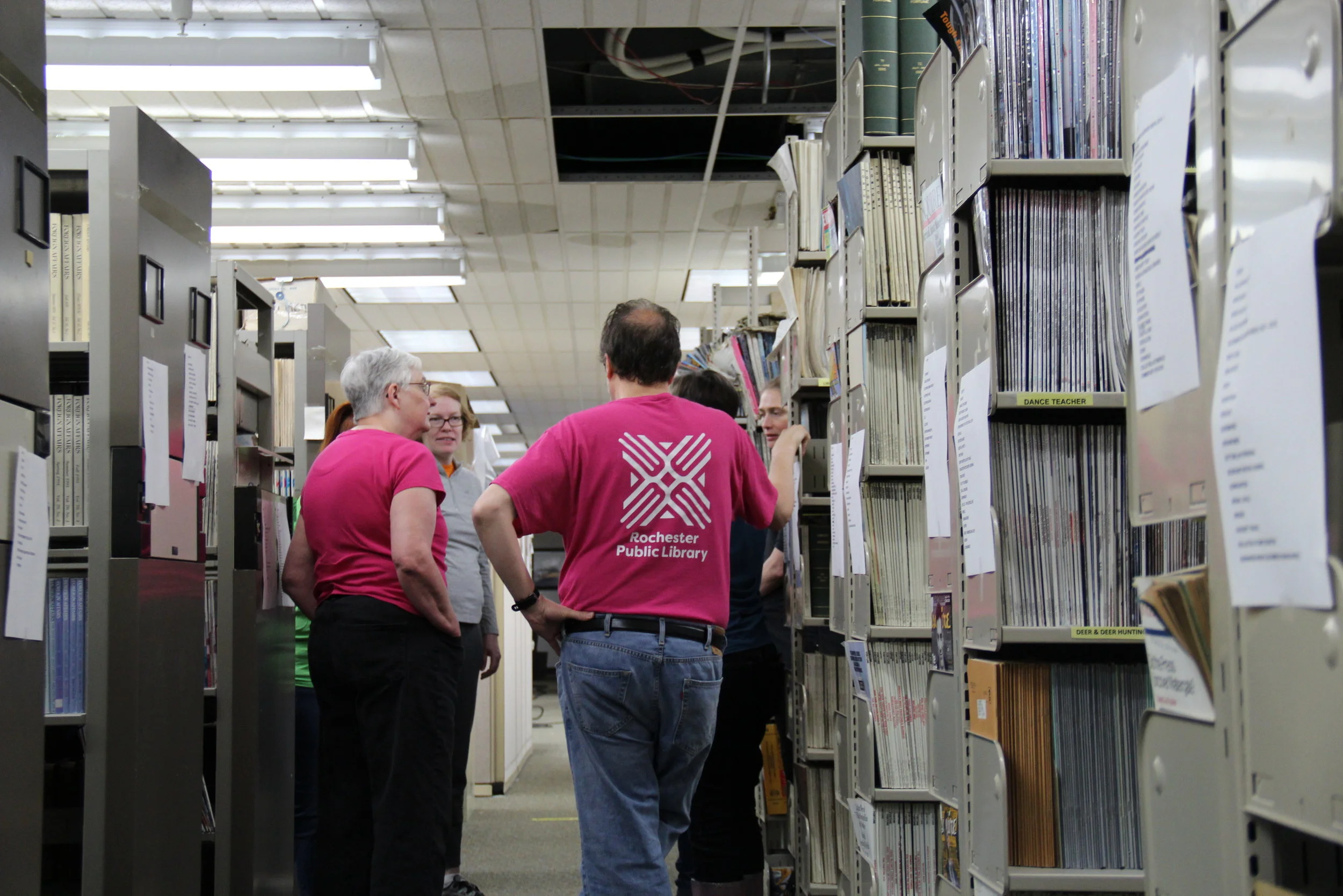 Library assessing damage caused by water leak
