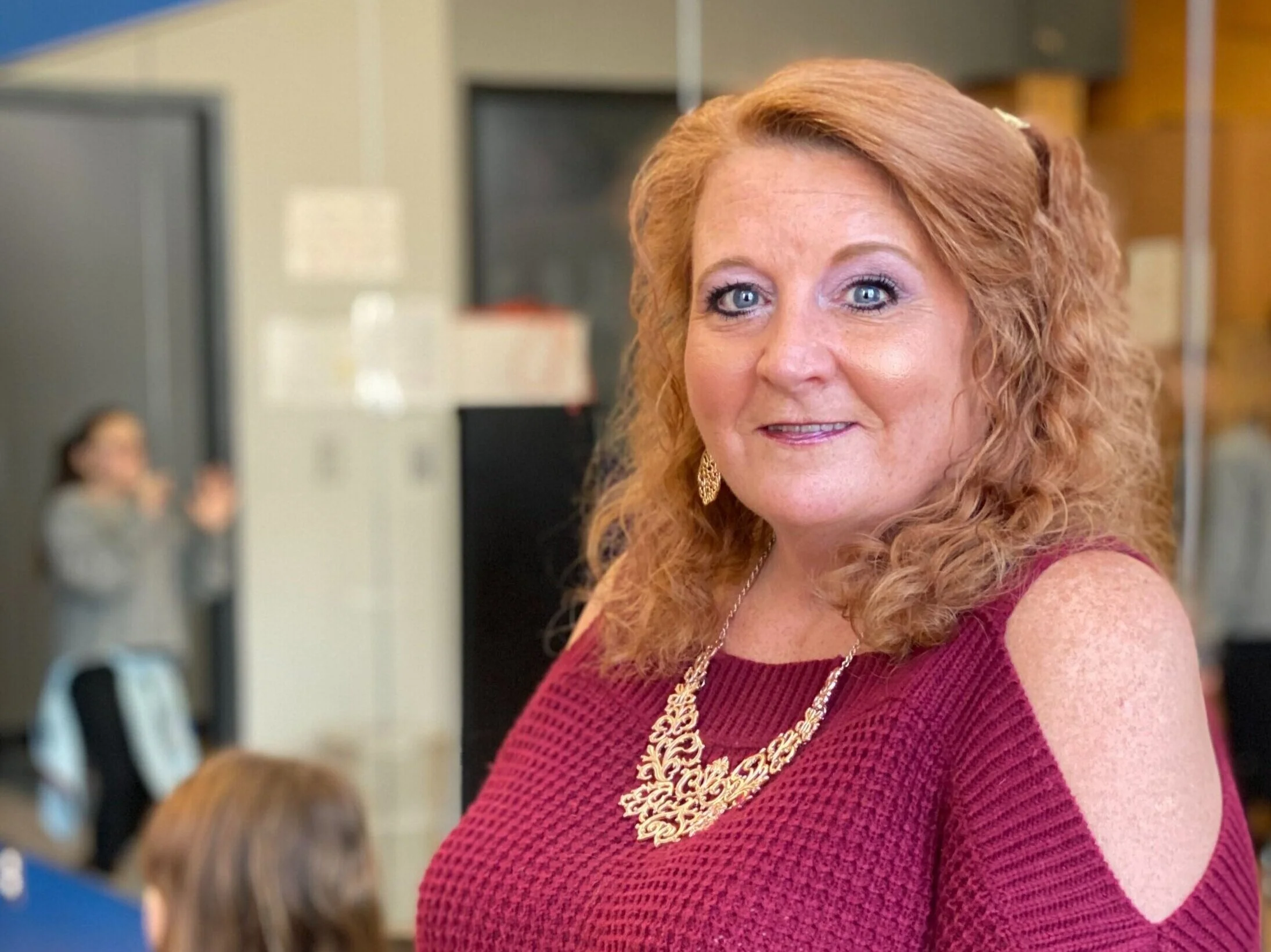 Her official title is dance instructor, but most of the kids just call her 'Mama Rhonda'