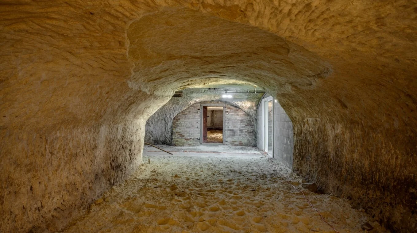 Why is a cave attached to this historic Rochester home? There are a couple of theories.
