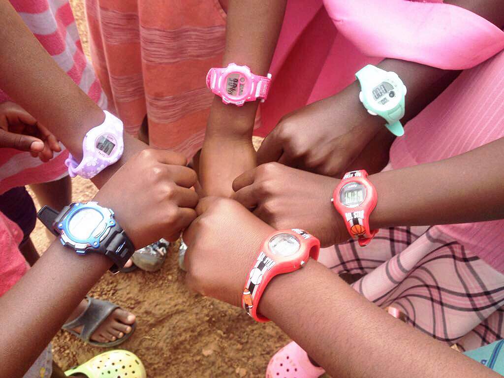 A few cherish girls showing off their donated watches