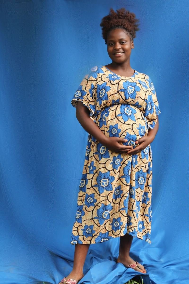 Cherish Uganda, Maternity Photoshoot with Kasey Werner (blue bkg).jpg