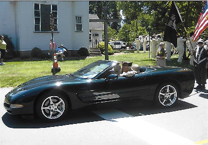 Don rides in parade courtesy of Ayer's Chevrolet