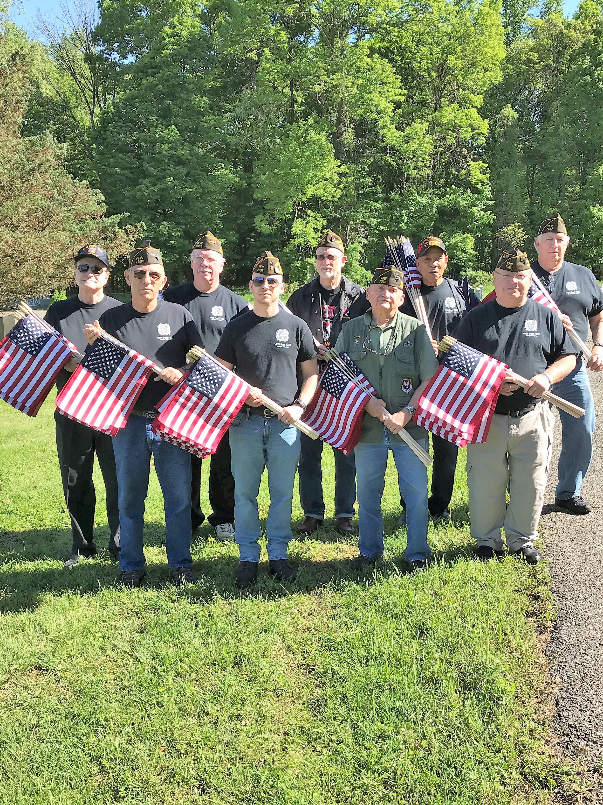  For Memorial Day our Post places flags on the graves of veterans in seven cemeteries in Randolph. Shown here (L to R) are Bill, Ken, John, Scott, Len, the Colonel, Emerson, Ted, Dan. Quartermaster Jack took the photo. We were honored to express our 