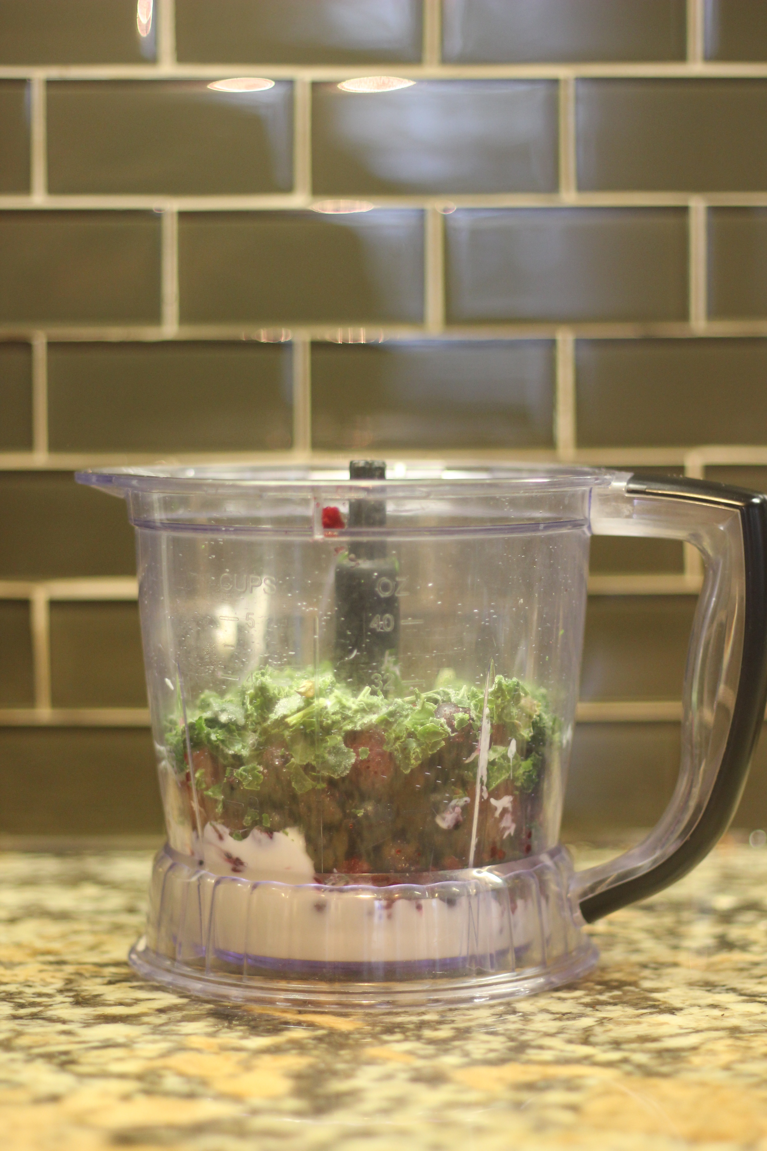 Do you see that bit of raspberry on the edge of the blender like it's threatening to jump?
