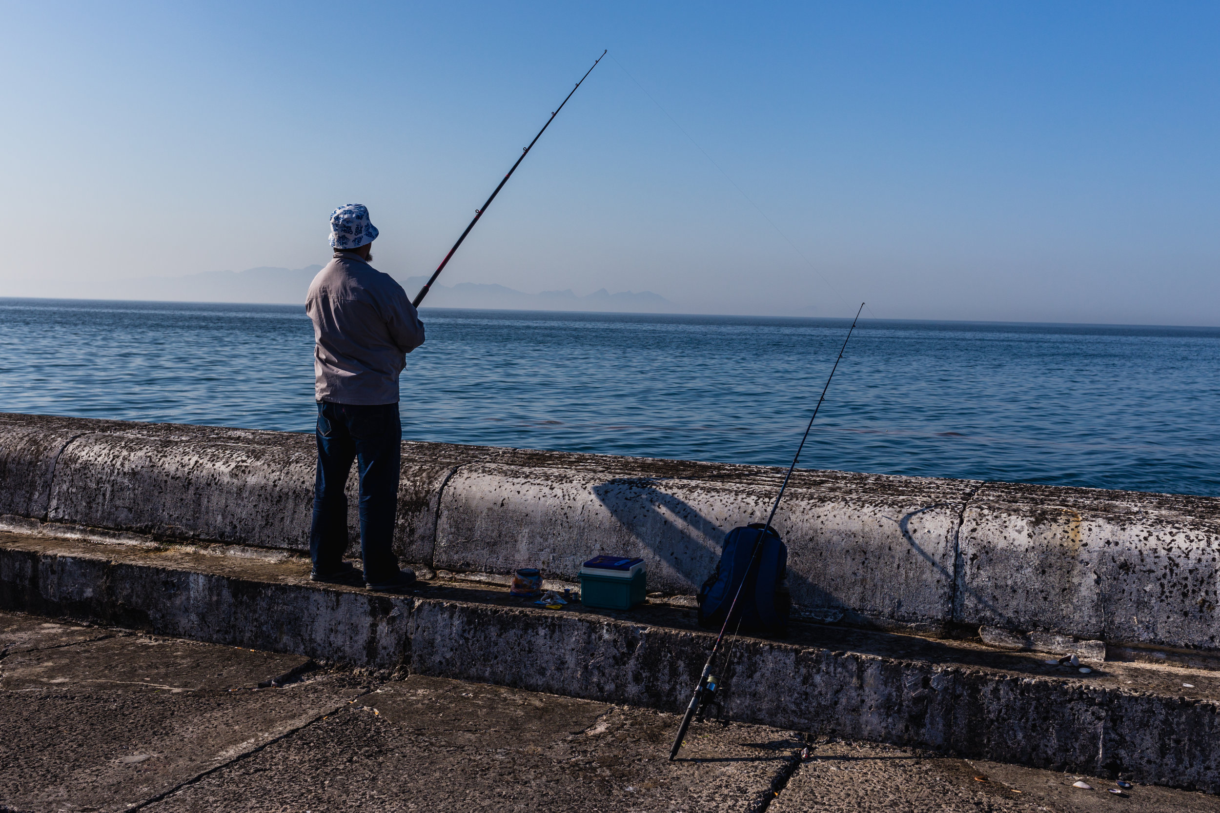 Quay Fisherman. Kalk Bay, South Africa (Aug. 2019)