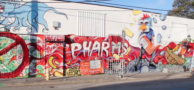 Watch Projectivity & GuerillaHealer paint 120 ft mural in Miami with a message