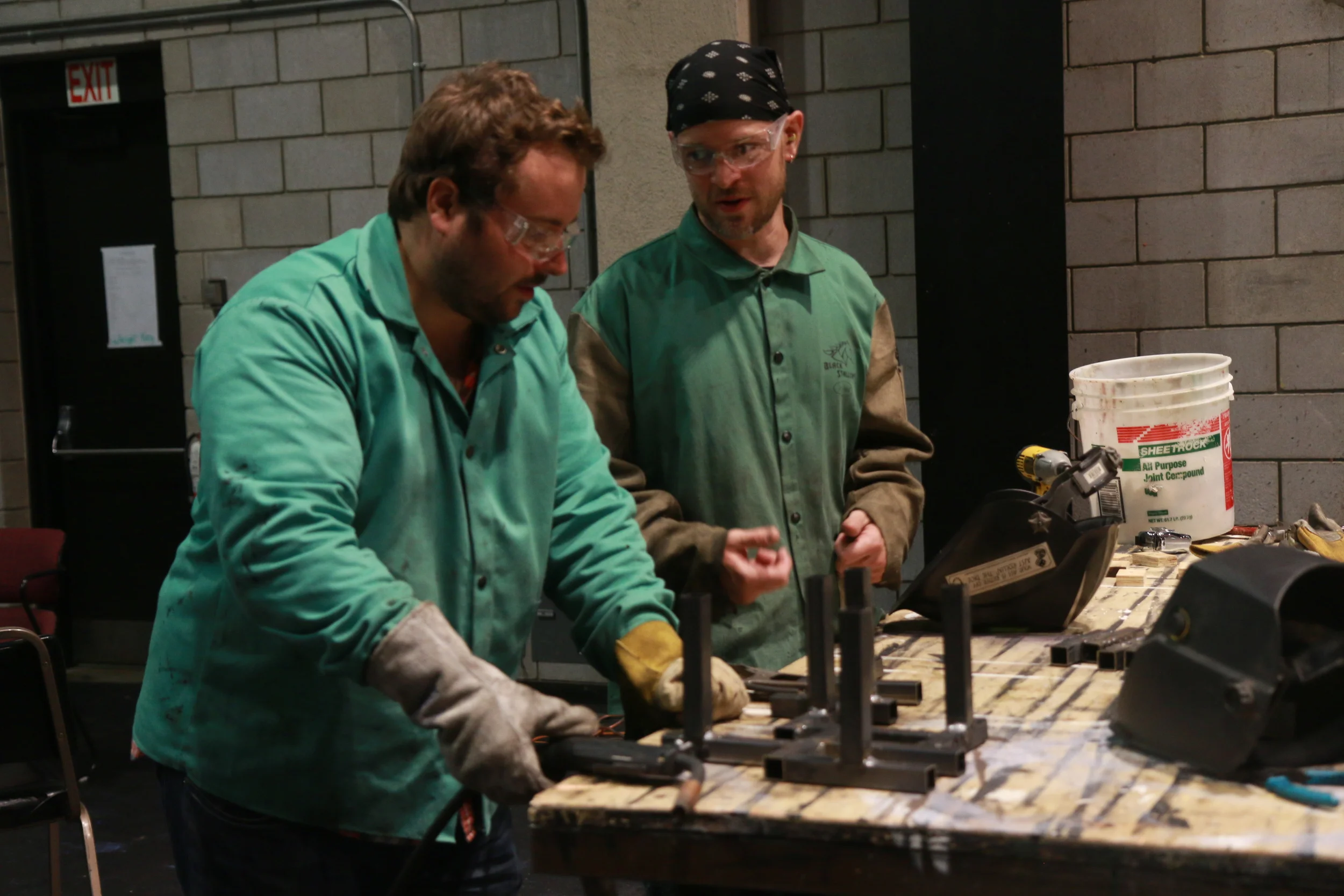 Max learns new welding skills from Guthrie Lead Carpenter and Tech Tools instructor Nate Saul.