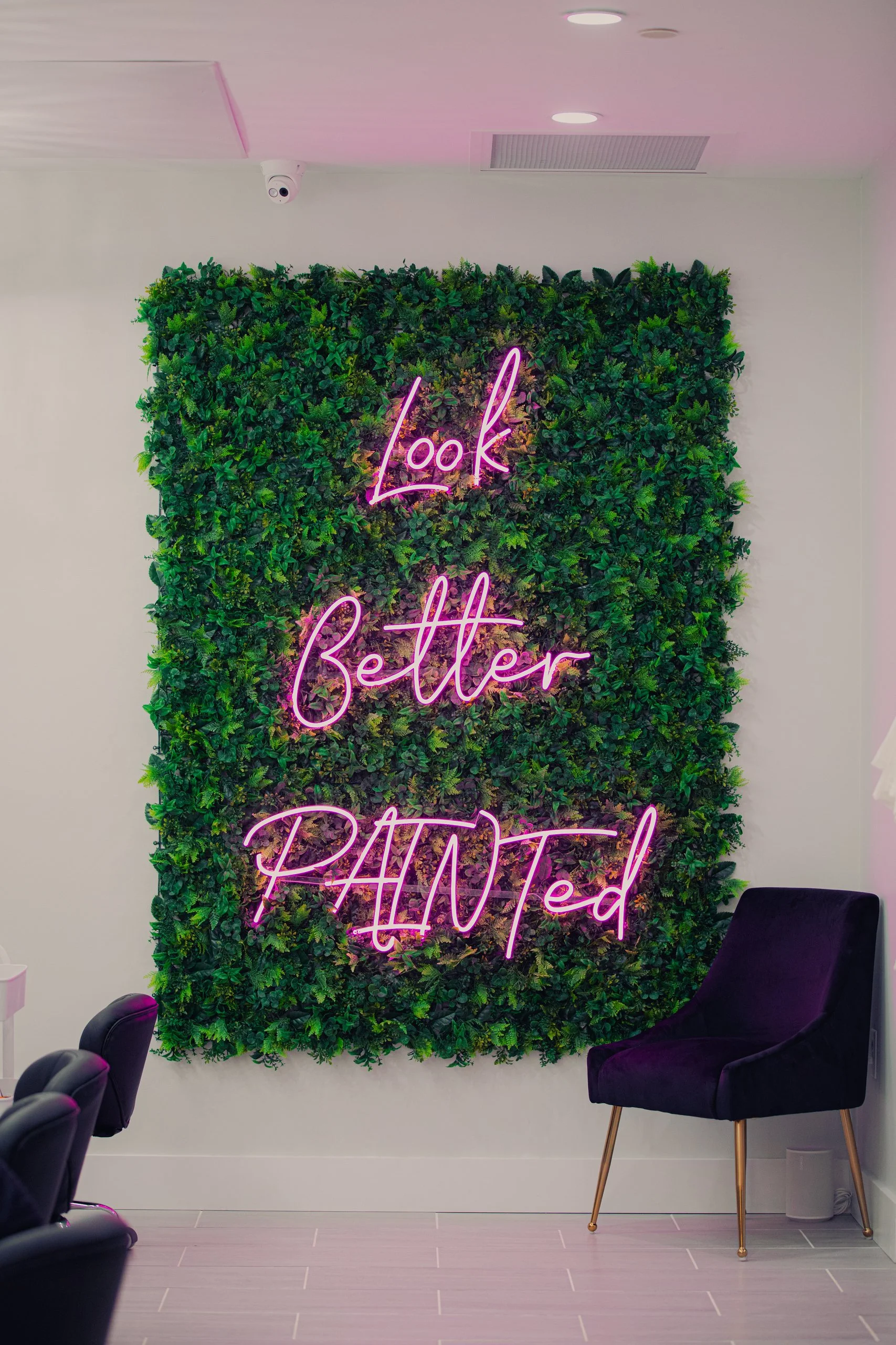  Neon sign saying "Look Better Painted" at PAINT nail bar in Oklahoma City 