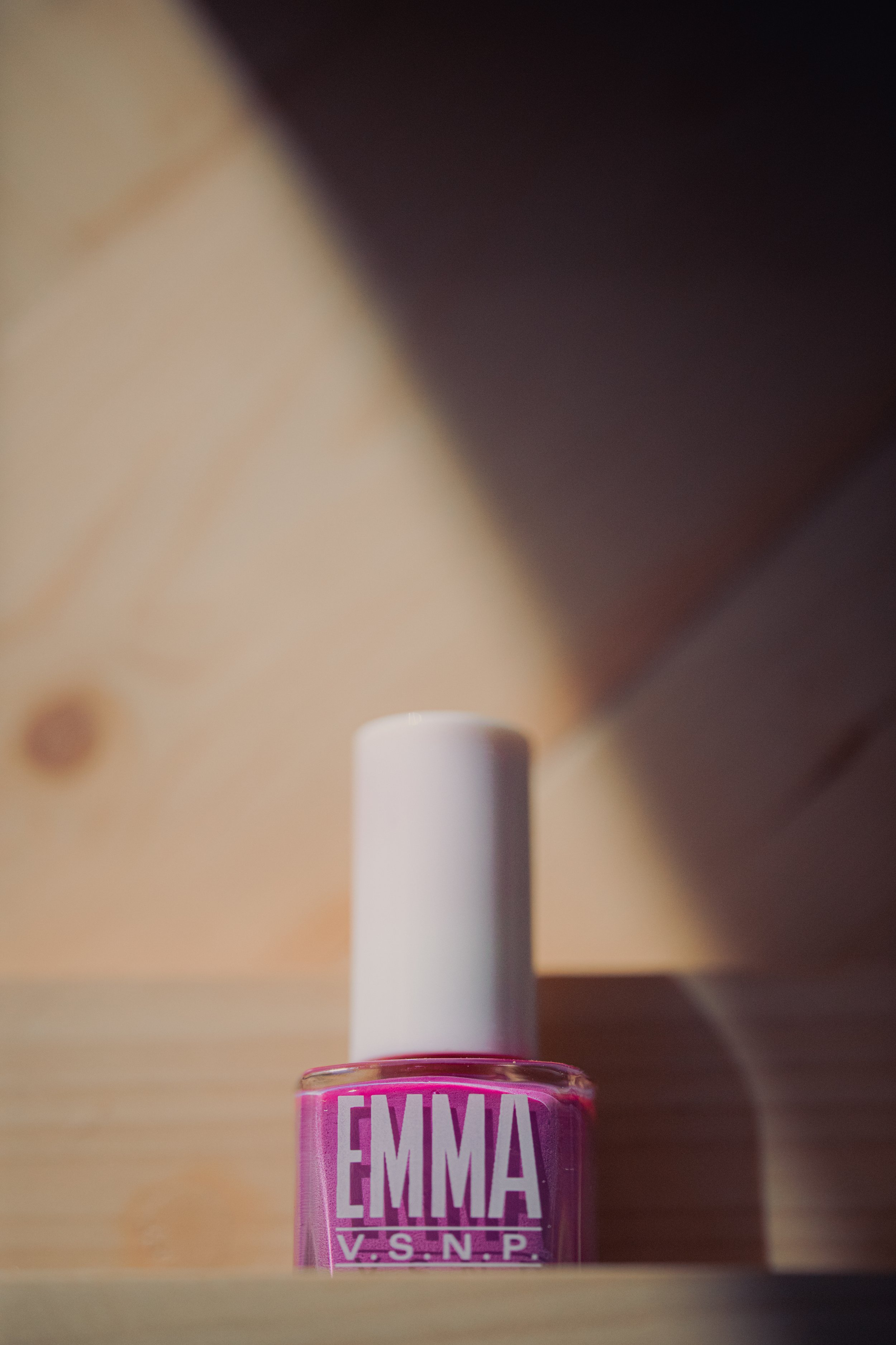  Commercial product shot of Emma V.S.N.P. nail polish bottle. Professional brand photography 