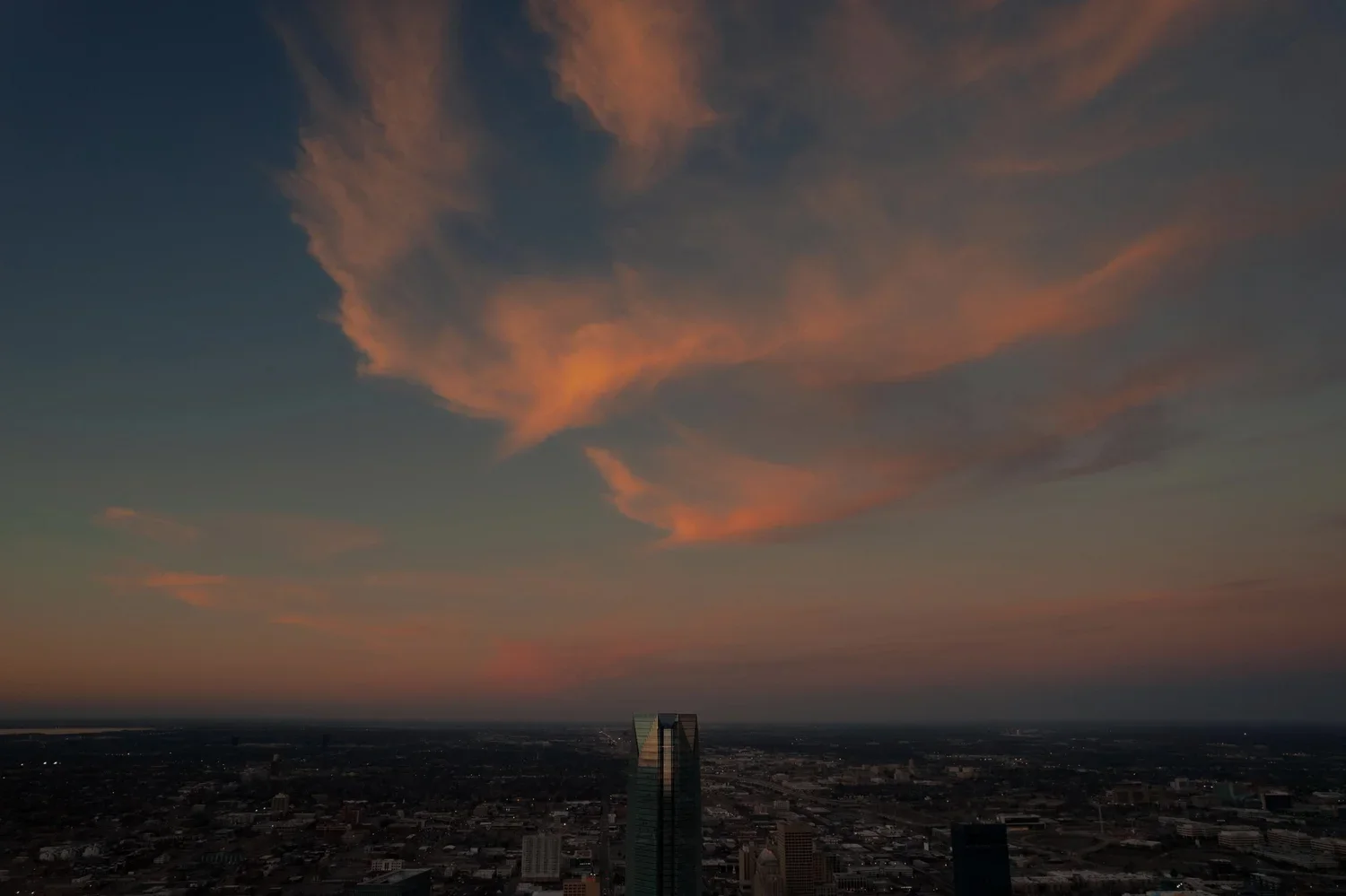 drone-architecture-devon-tower-downtown-sunset-skyline-pink-clouds.webp