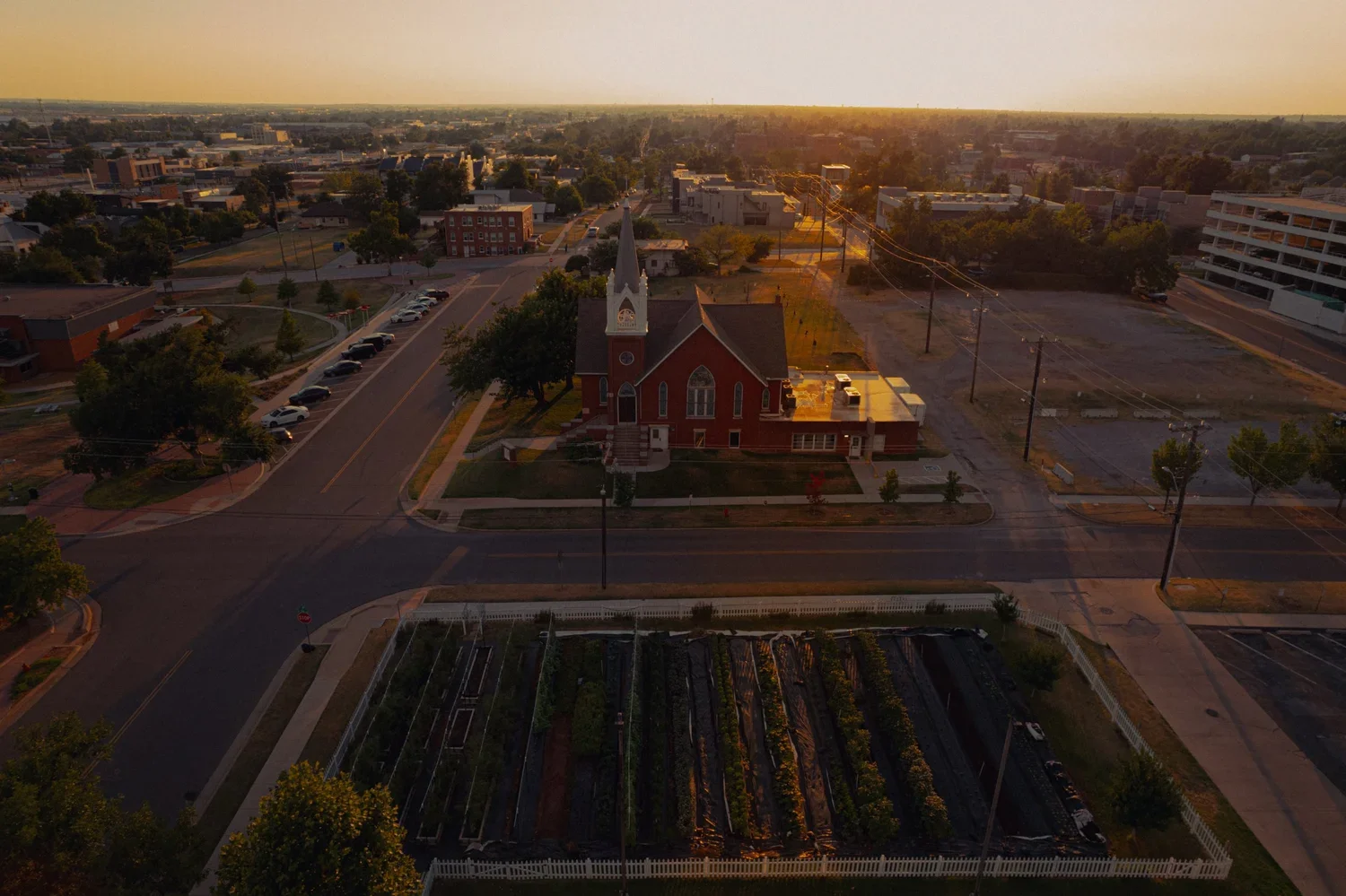 drone-documentary-sunset-8th-street-church-urban-farm.webp
