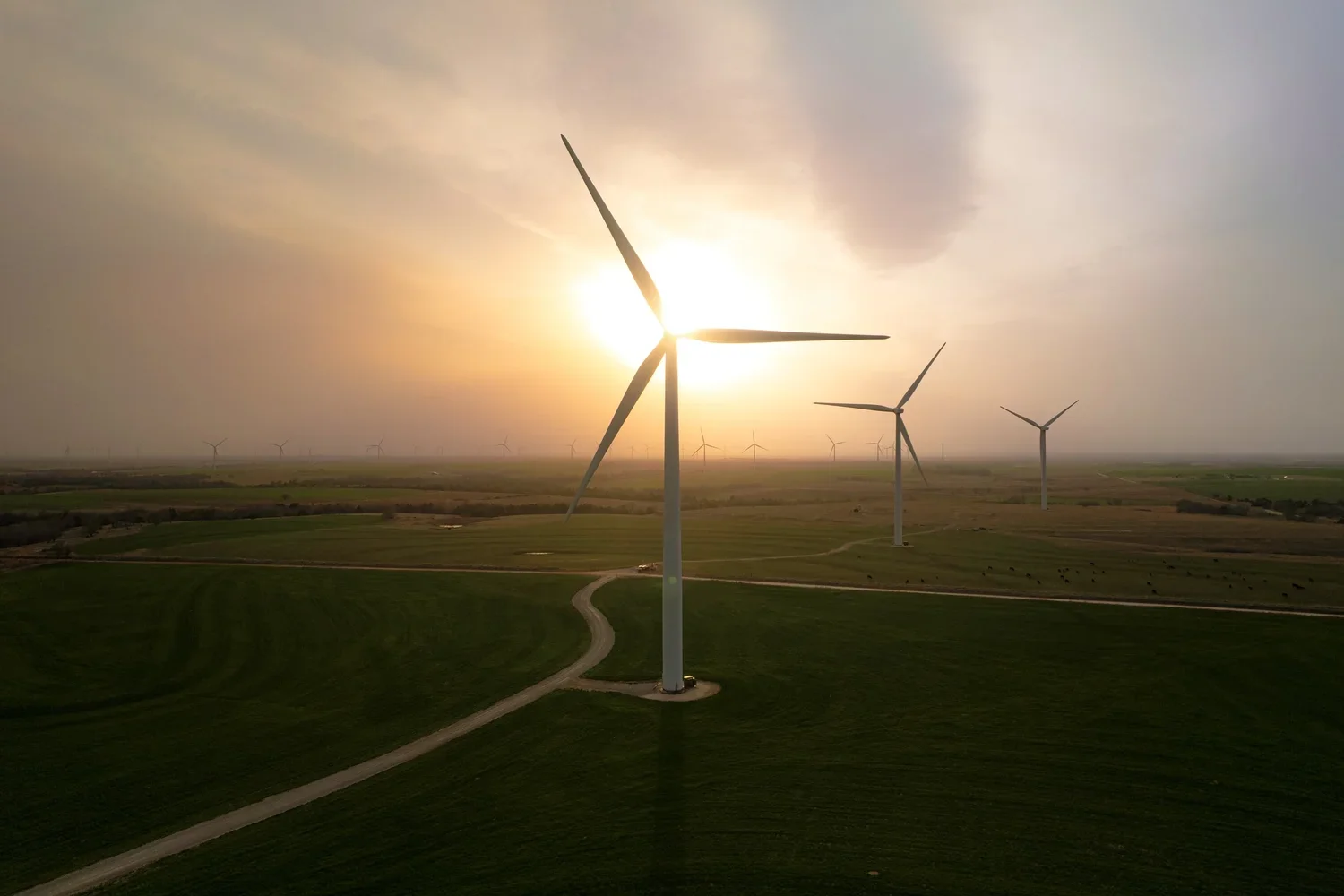 drone-editorial-wind-turbines-oklahoma-rural-sunrise.webp