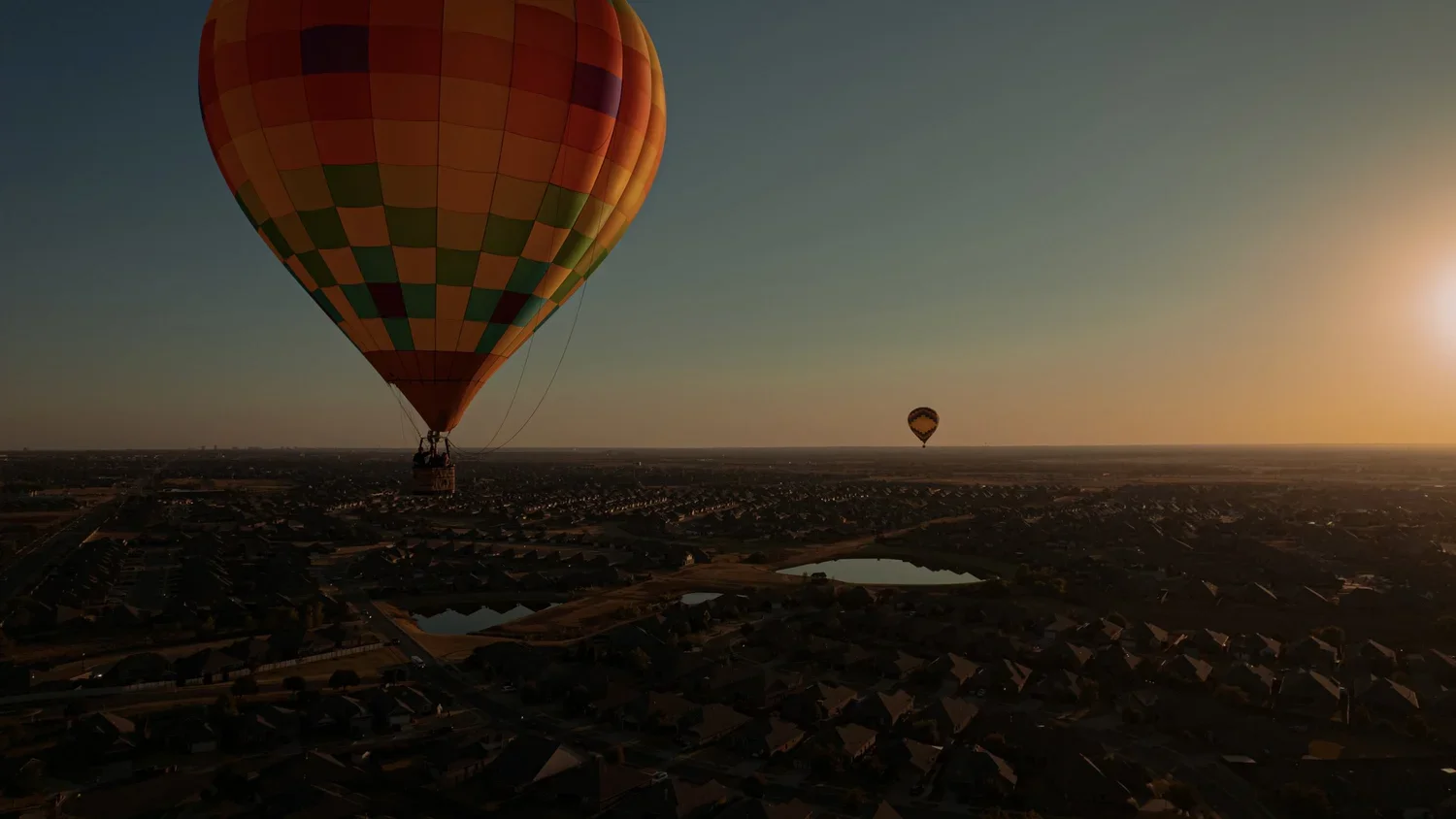 drone-hot-air-balloon-okc-golden-hour.webp