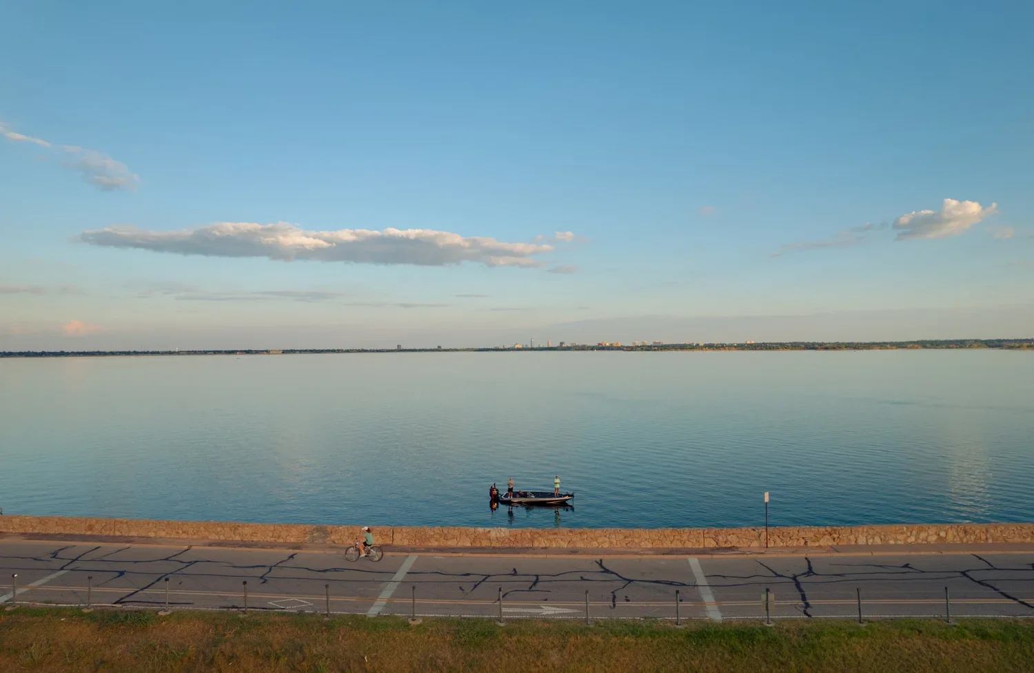 drone-lake-hefner-fisherman-boat-golden-hour.webp