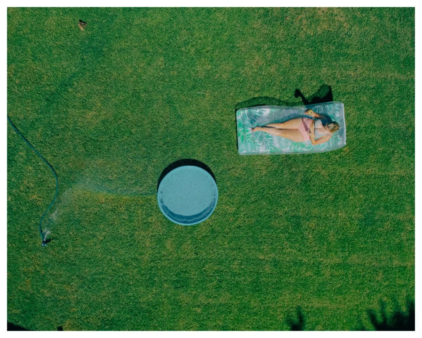drone-lifestyle-edmond-oklahoma-overhead-summer-bikini-sprinkler.jpg