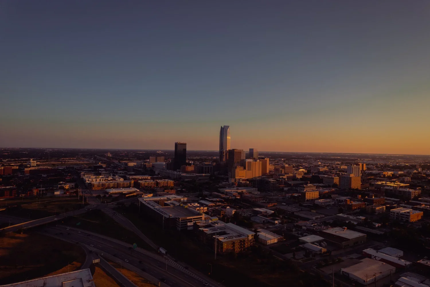 drone-skyline-okc-devon-tower-golden-hour-sunset.webp