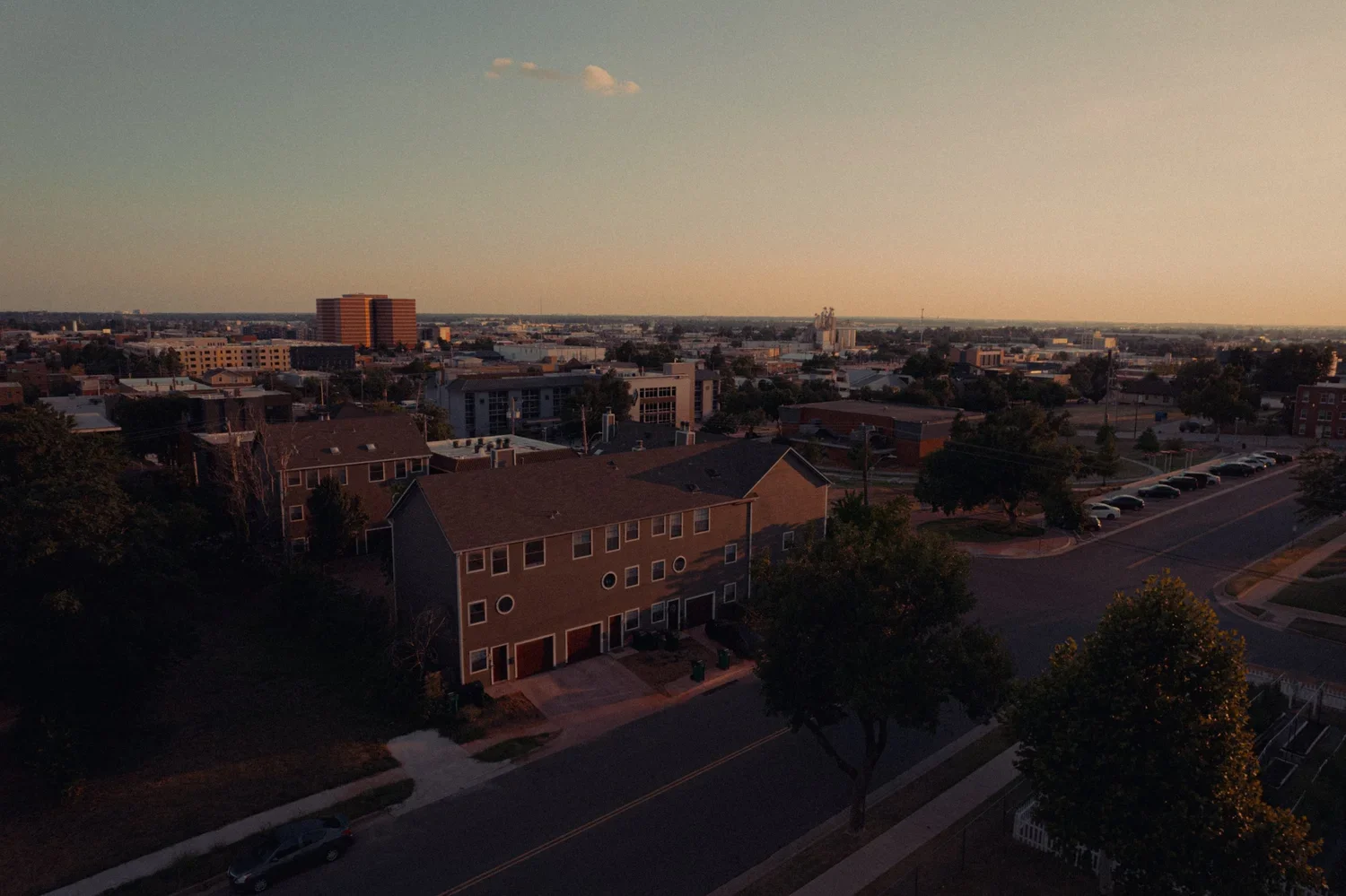 drone-sunset-downtown-okc-residential-real-estate.webp