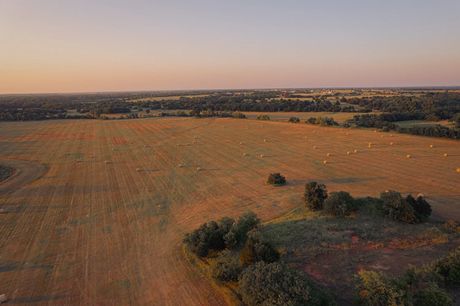 landscape-drone-golden-hour-rural-farm-land-oklahoma.webp