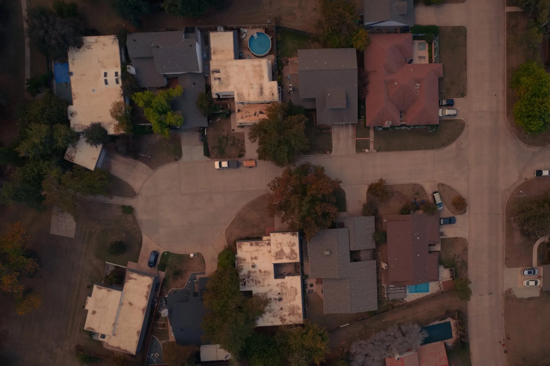 overhead-drone-residential-real-estate-neighborhood-homes.jpg