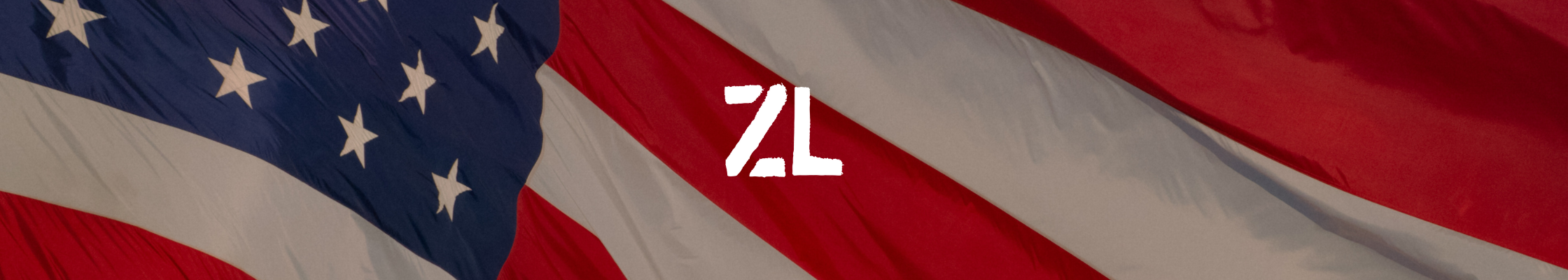 Cinematic American flag photography used as a hero banner on a creative photography and video portfolio