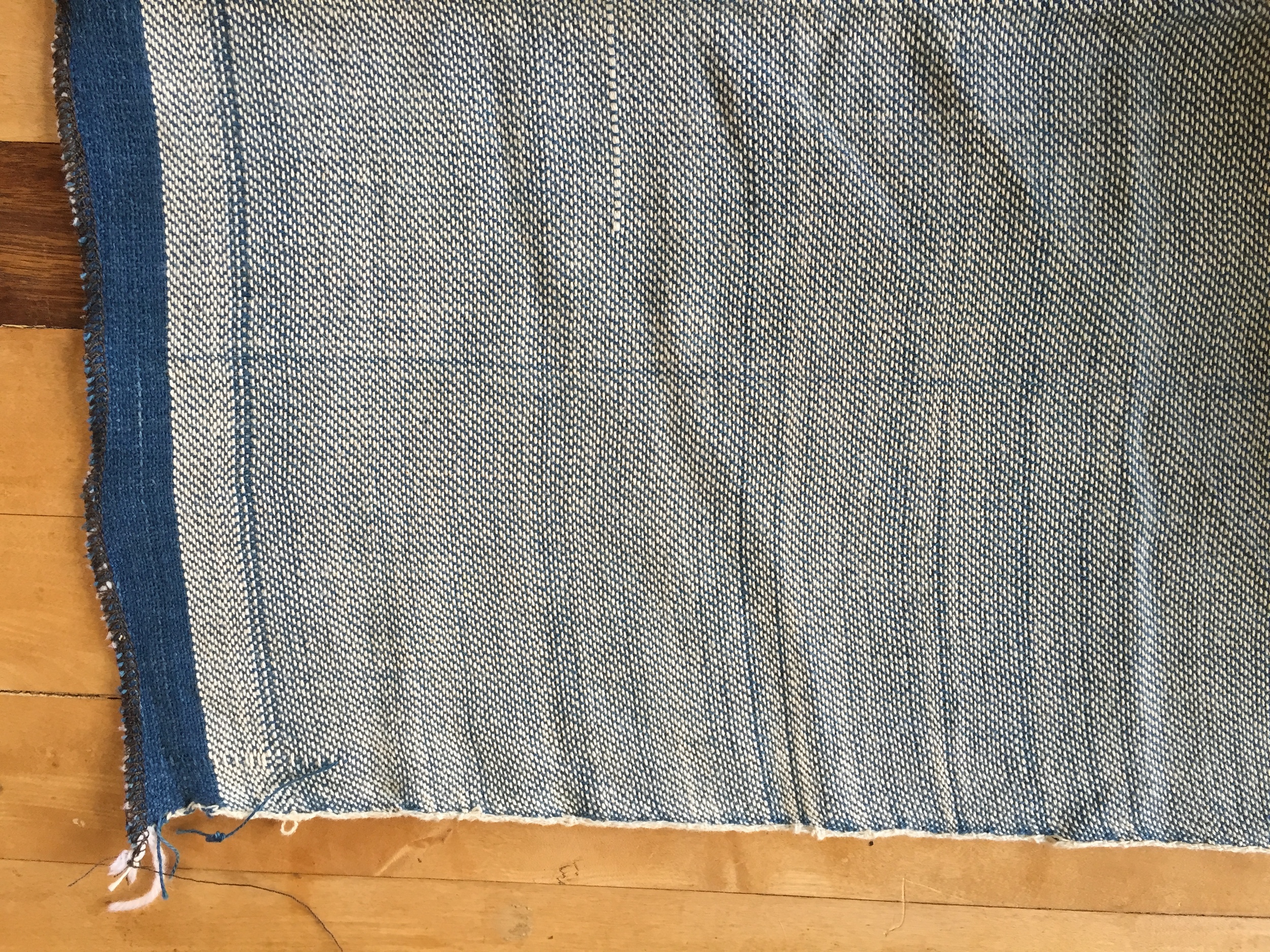 Little errors and runs in the beginning of the weaving process give our handwoven denim a lot of character and slubbiness. 