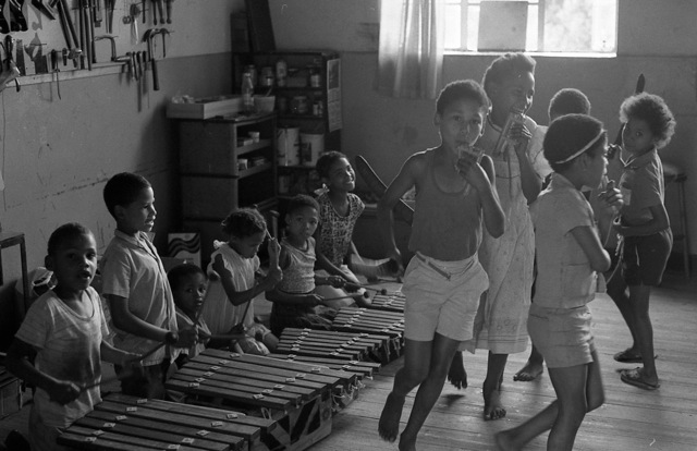 Kids on marimba, and pipe-dance in the Kwangoma workshop, Suurbraak. "They would regularly come around and play!"