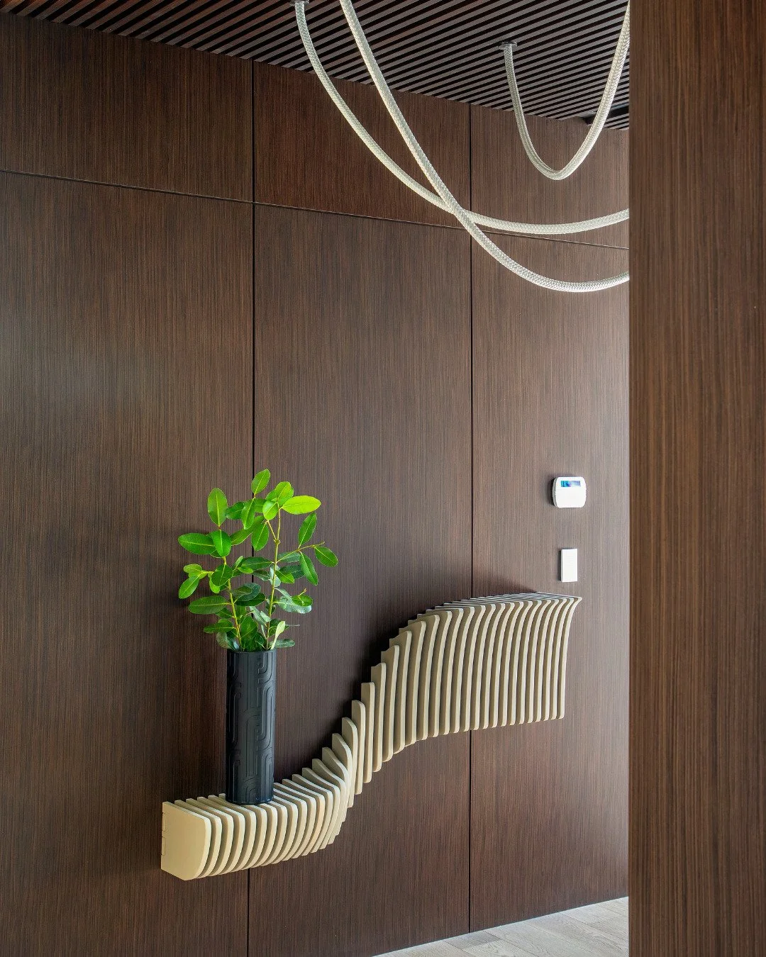 Every detail tells a story.
This residence was designed around the way its owners truly live, bold where it needs to be and quiet where it matters most. From the sculptural pendant in the dining room to the marble vanity, from the stone-framed firepl