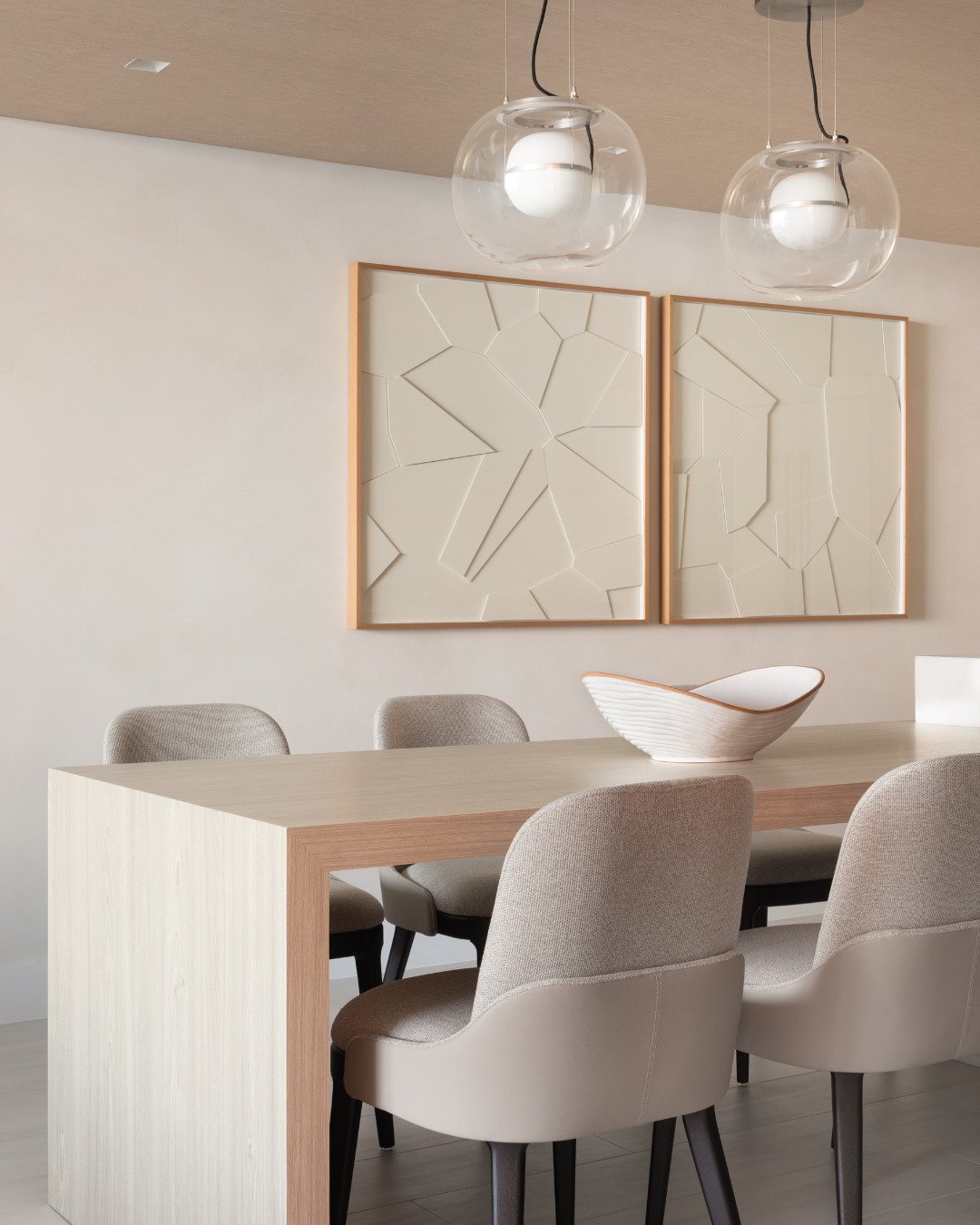 A project isn't defined by a single statement piece.

It's defined by the way every detail works together.

From the geometric wallpaper to the layered artwork, the marble console, and the warmth of natural wood, each element has its own purpose whil