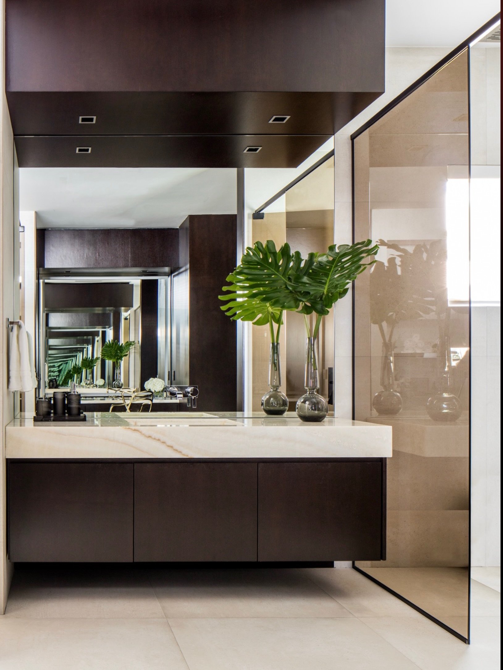 A primary bathroom we designed 10 years ago. We love timeless design.