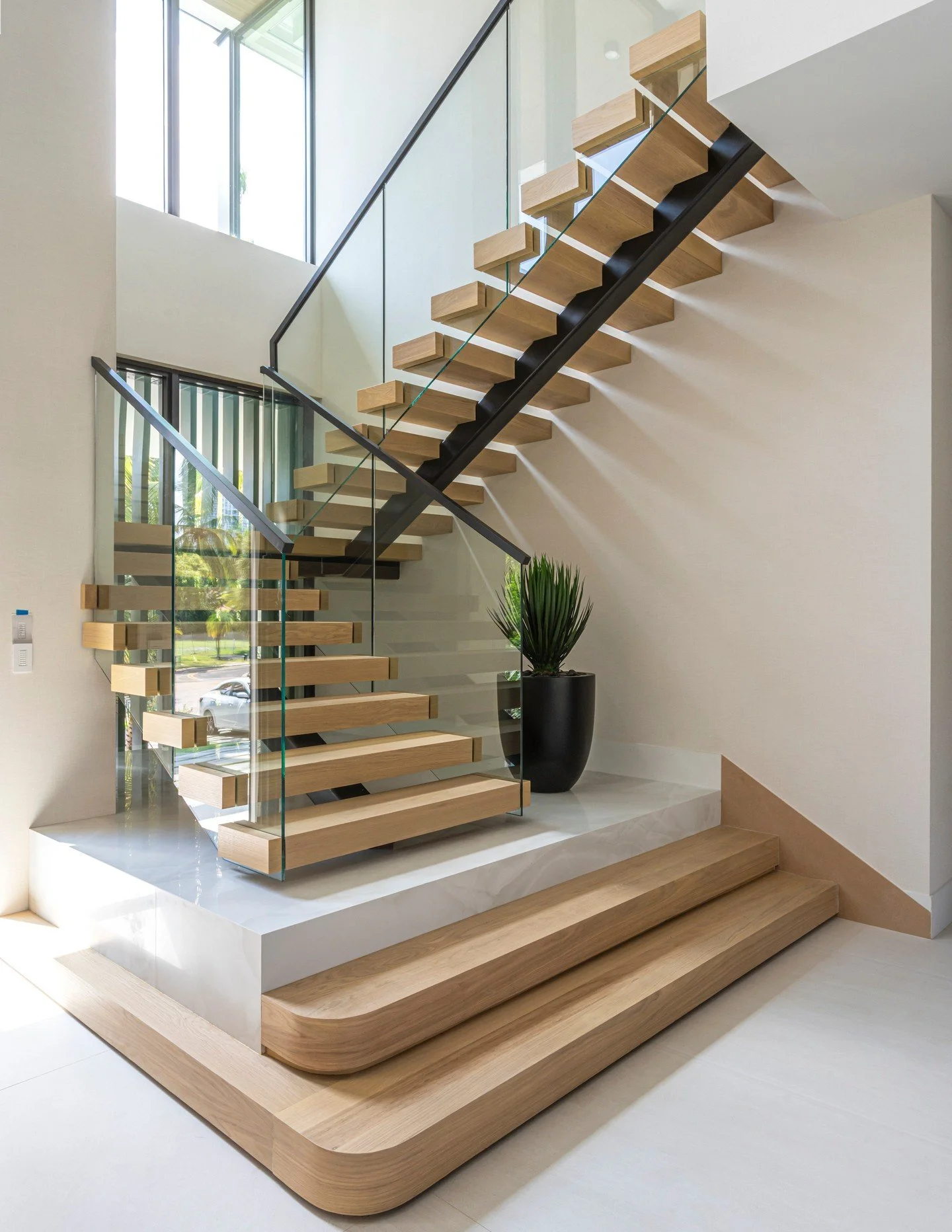 The first impression starts here.

The foyer and staircase introduce the home, showing how even the spaces we simply pass through can become part of the experience