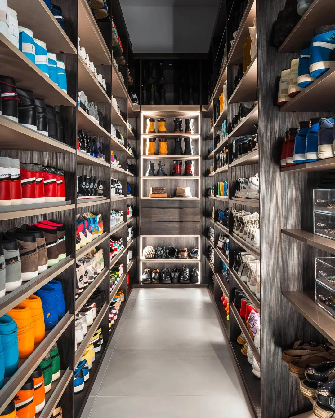We couldn&rsquo;t revisit this home without another look at that sneaker collection.

The closet, kitchen, and dining area show a different side of this home. Open shelving puts the shoes on display, the kitchen pairs generous work surfaces with seat