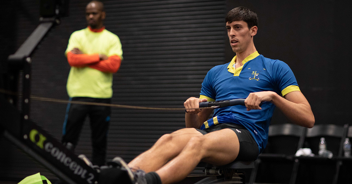 The University of Delaware Men’s Crew team won the Winter Race to Raise fundraising competition for the third consecutive year by raising nearly $5,000 for their program. They also defended their title in the Run, Row, Bike Men's Team division of the indoor triathlon. Joseph William Conesa Purman (pictured here) set a new indoor triathlon record in the erg, with 4441 meters (2.76 miles) in 15 minutes. Purman, a member of the Puerto Rico National Team in the 2015 World Championships, is currently training for the 2020 Olympics after just barely missing a spot on the 2016 Olympic team. Photo credit Four Youth Productions .
