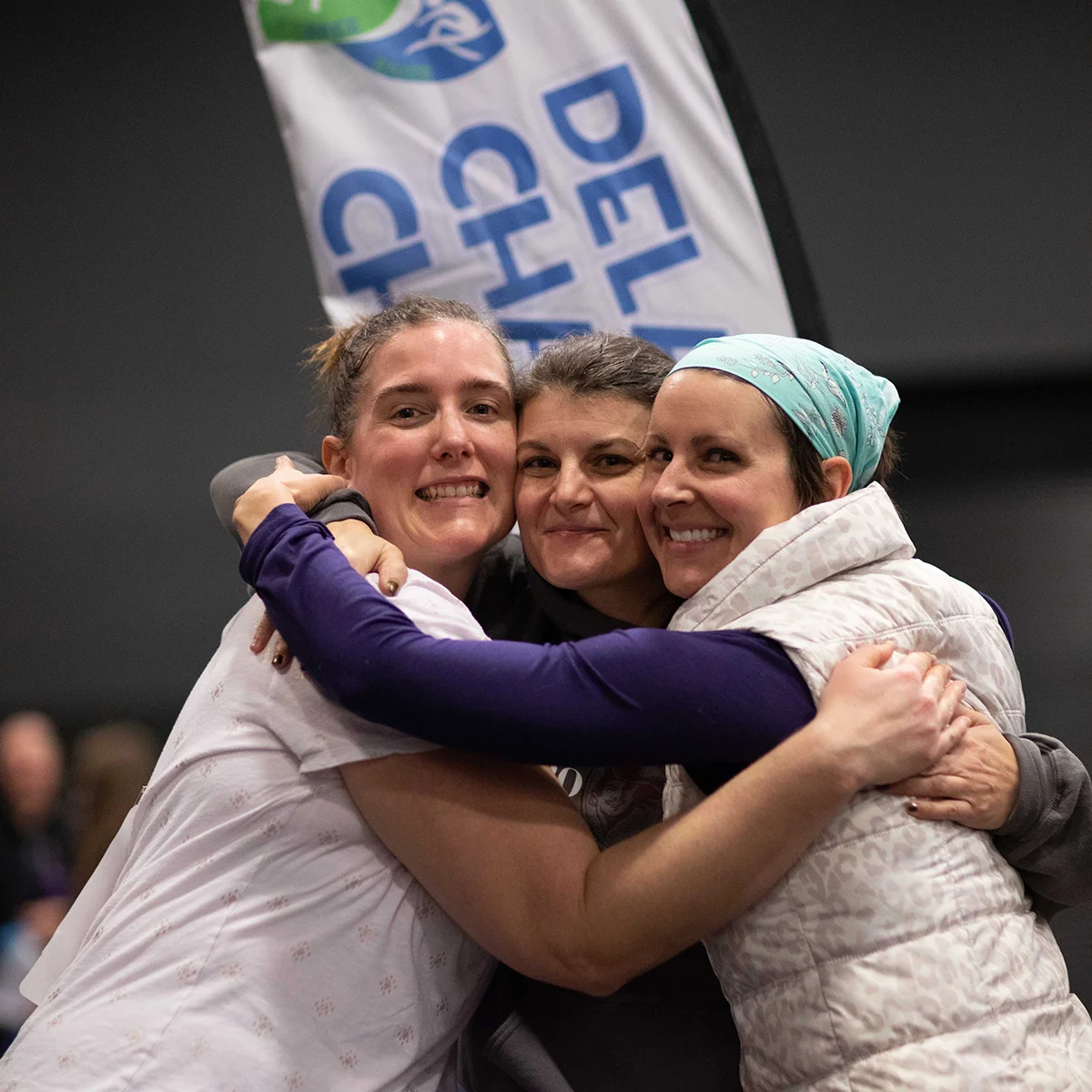Team Who Us? is all smiles after completing this year's Delaware Charity Challenge winter indoor triathlon.