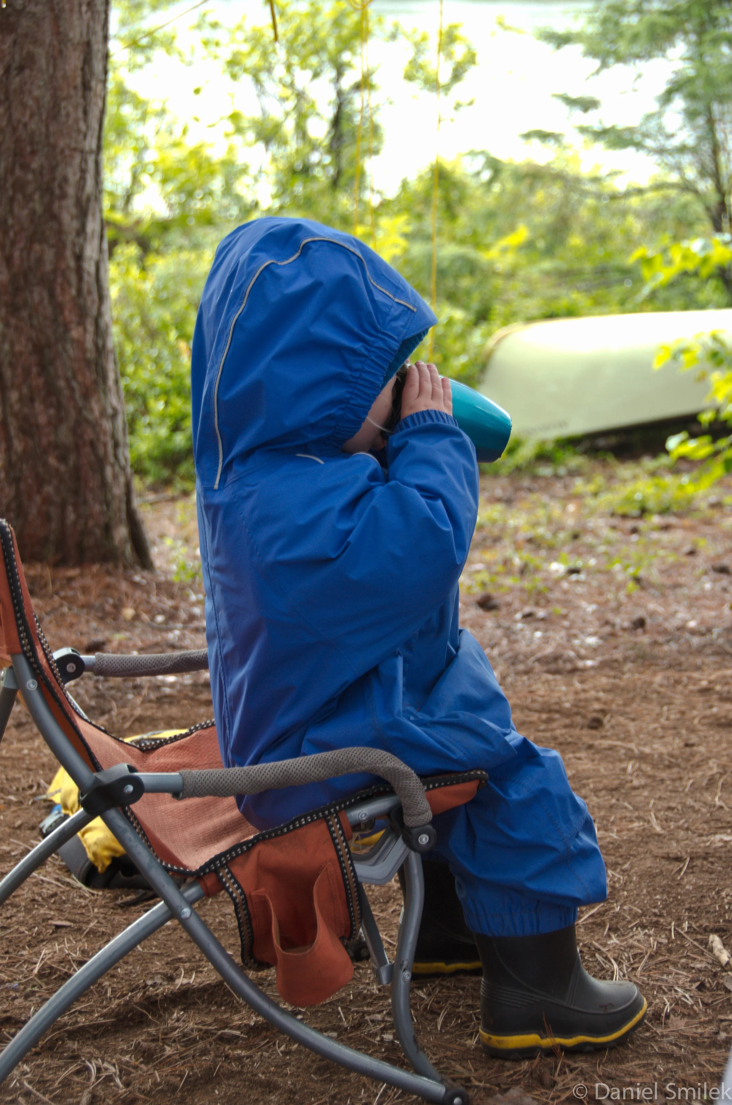 Grace at two years of age in the MEC Newt Rain Suit.