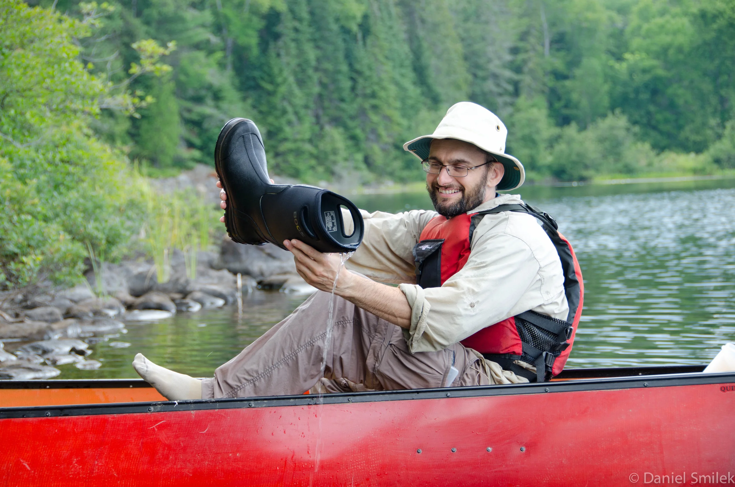 Uncle Dave emptying his BOGS boot after falling into the drink.