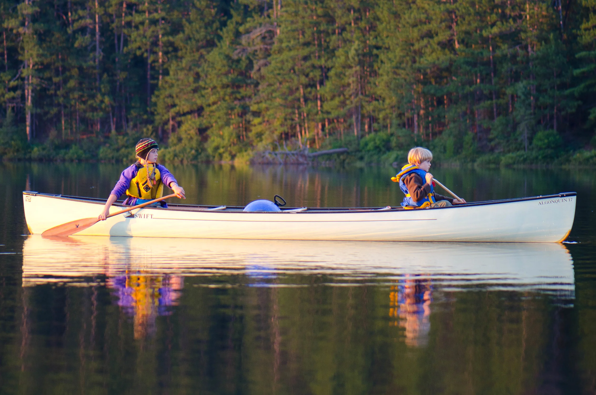 Anna and Josh paddling in the evening sun.