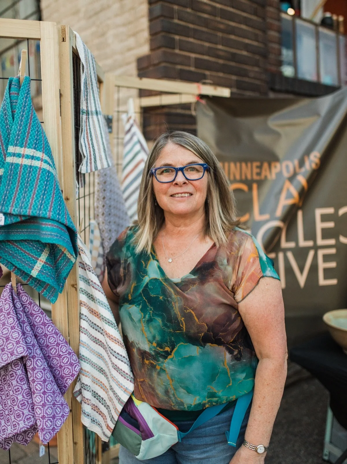 Before Art-A-Whirl ends, whirl to the @minneapolis.clay.collective studio and outdoor booth to shop beautiful ceramic pieces and handwoven kitchen towels by Kori Parish of Wonderful Things Fire.

#QarmaBuilding #QarmaMpls #ArtAWhirl #ArtAWhirl2026 #C
