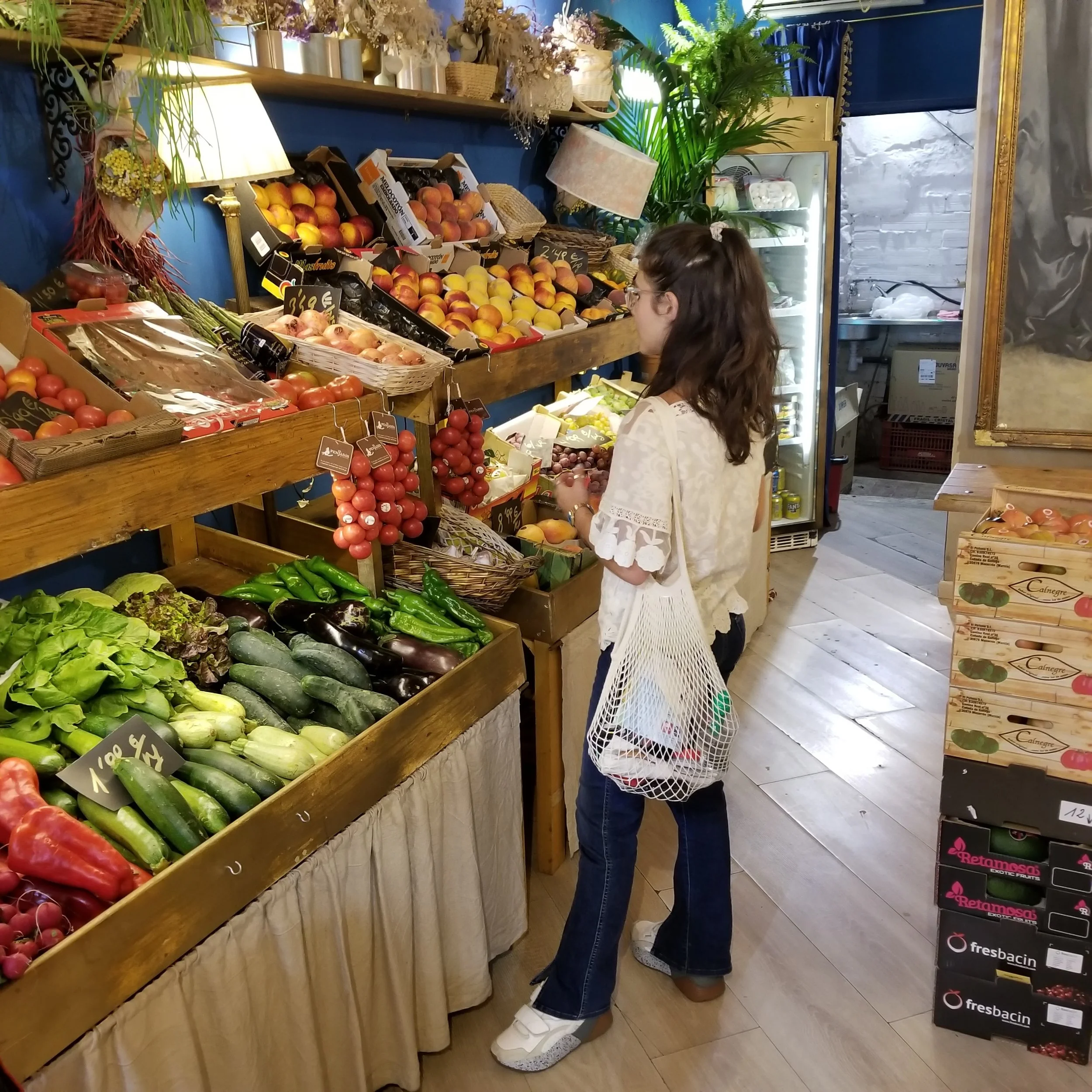 Buying fruits and veggies to cook in the Airbnb