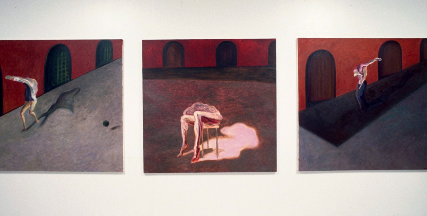 Three Dancers near Red Building