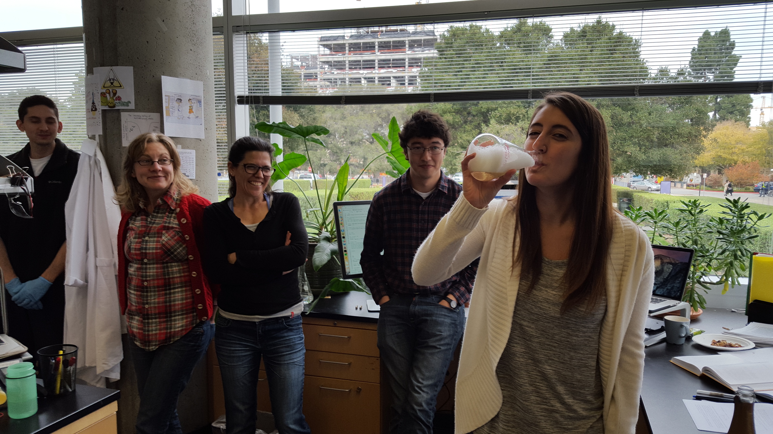 Fiona passes her quals - and drinks from the lab trophy!