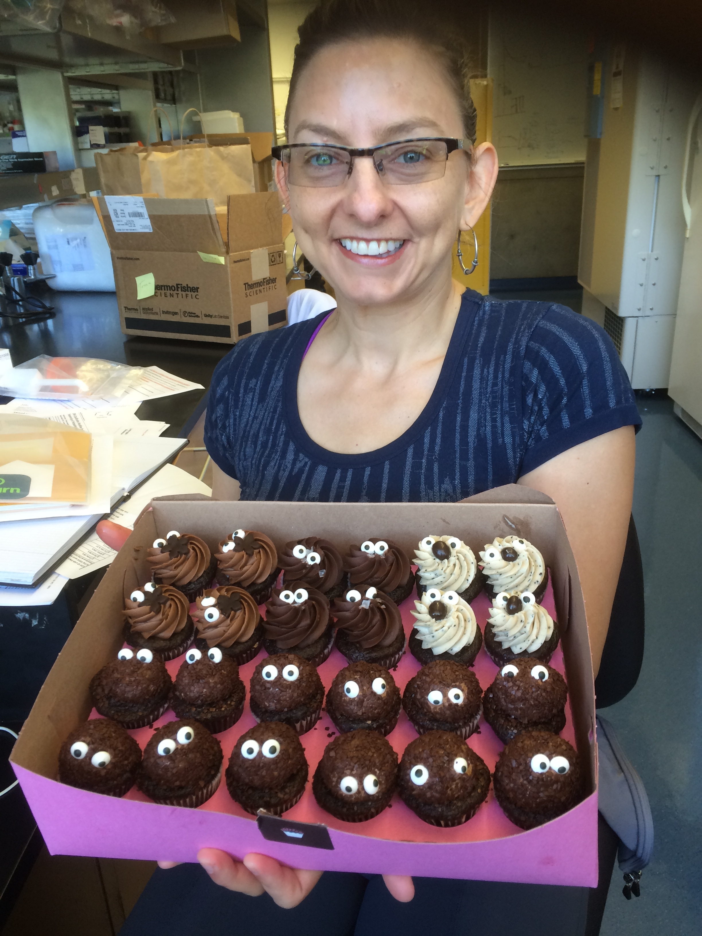 Tessa thanking our stool collection nurses with poop emoji themed cupcakes! 