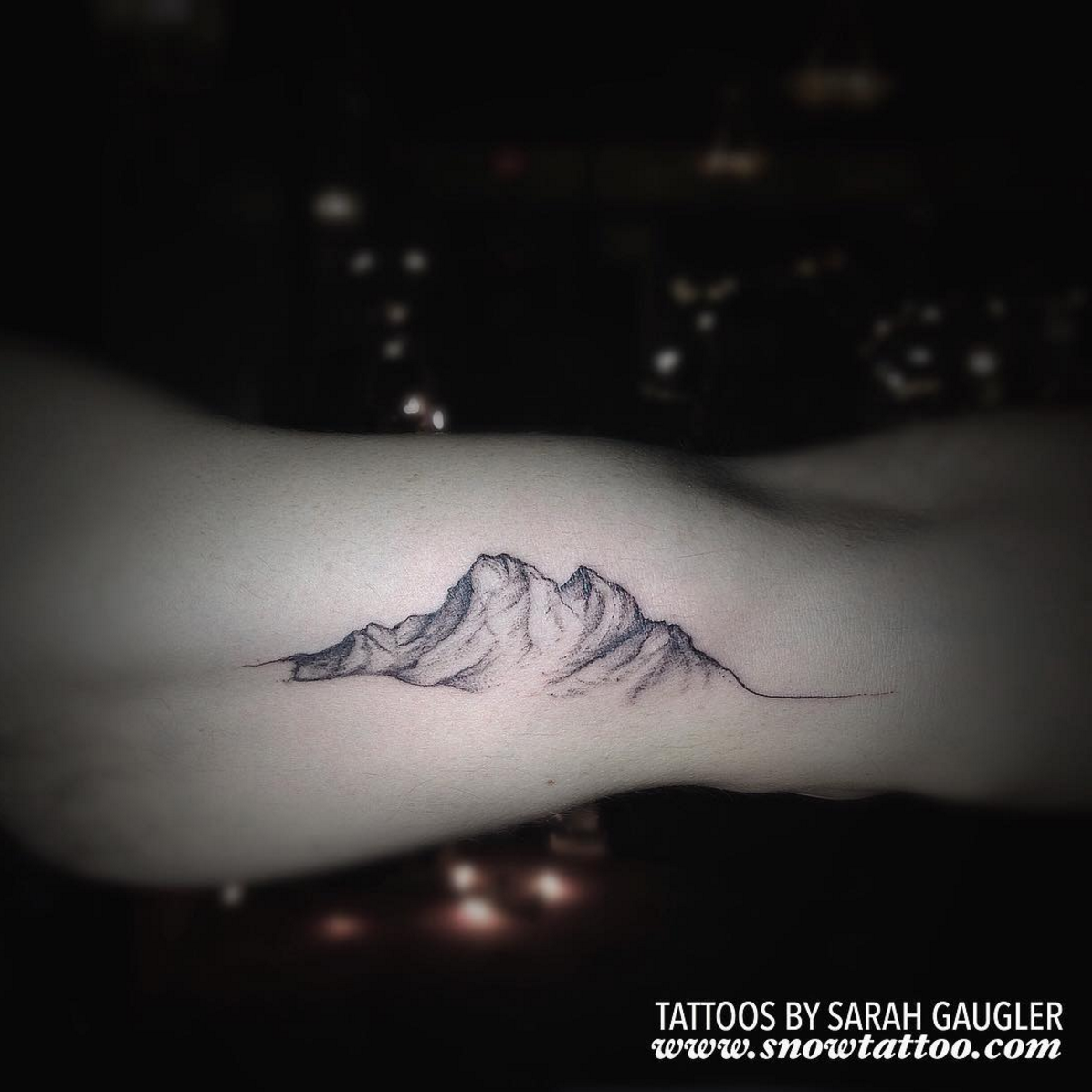 Mountain tattoo done in fine line located on the inner  Mountain tattoo  Tattoos Subtle tattoos